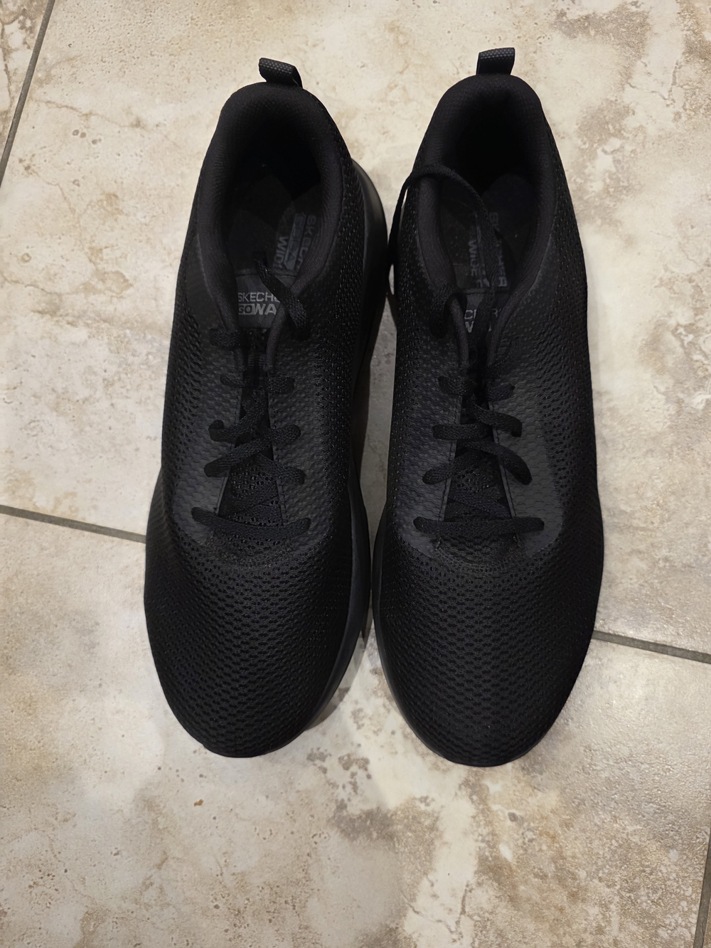 Skechers Men’s All-Black Slip-On Knit Sneakers